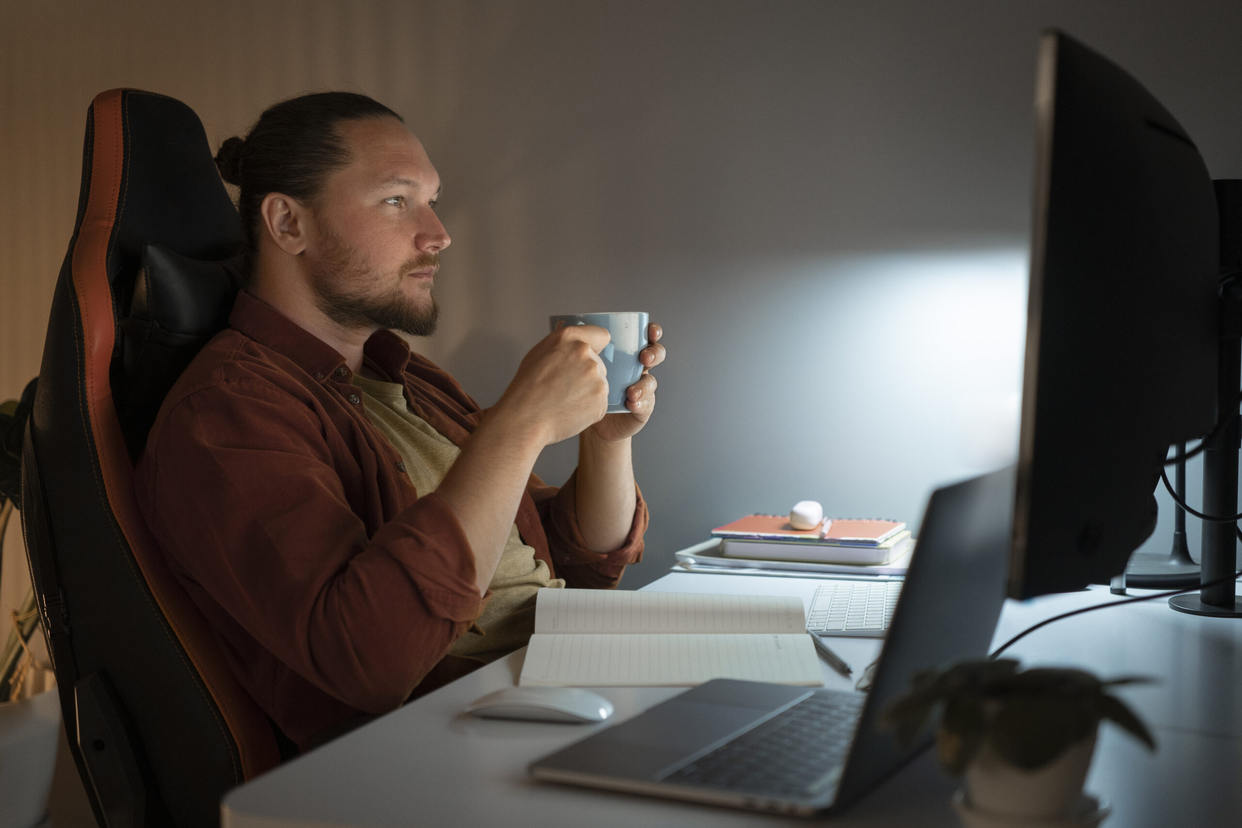 Person working on laptop for data entry jobs in USA