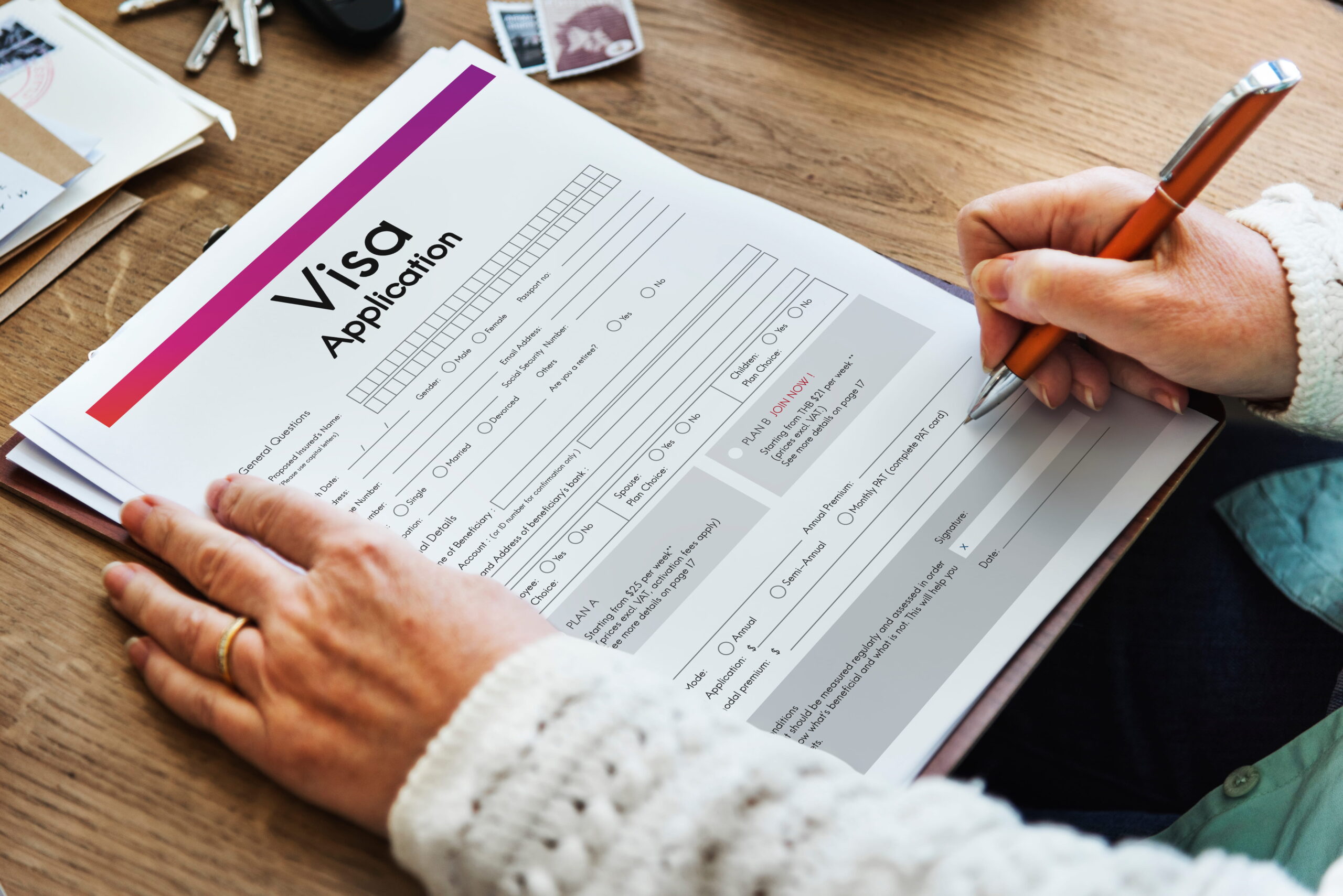 applicant organizing documents for USA visa job application