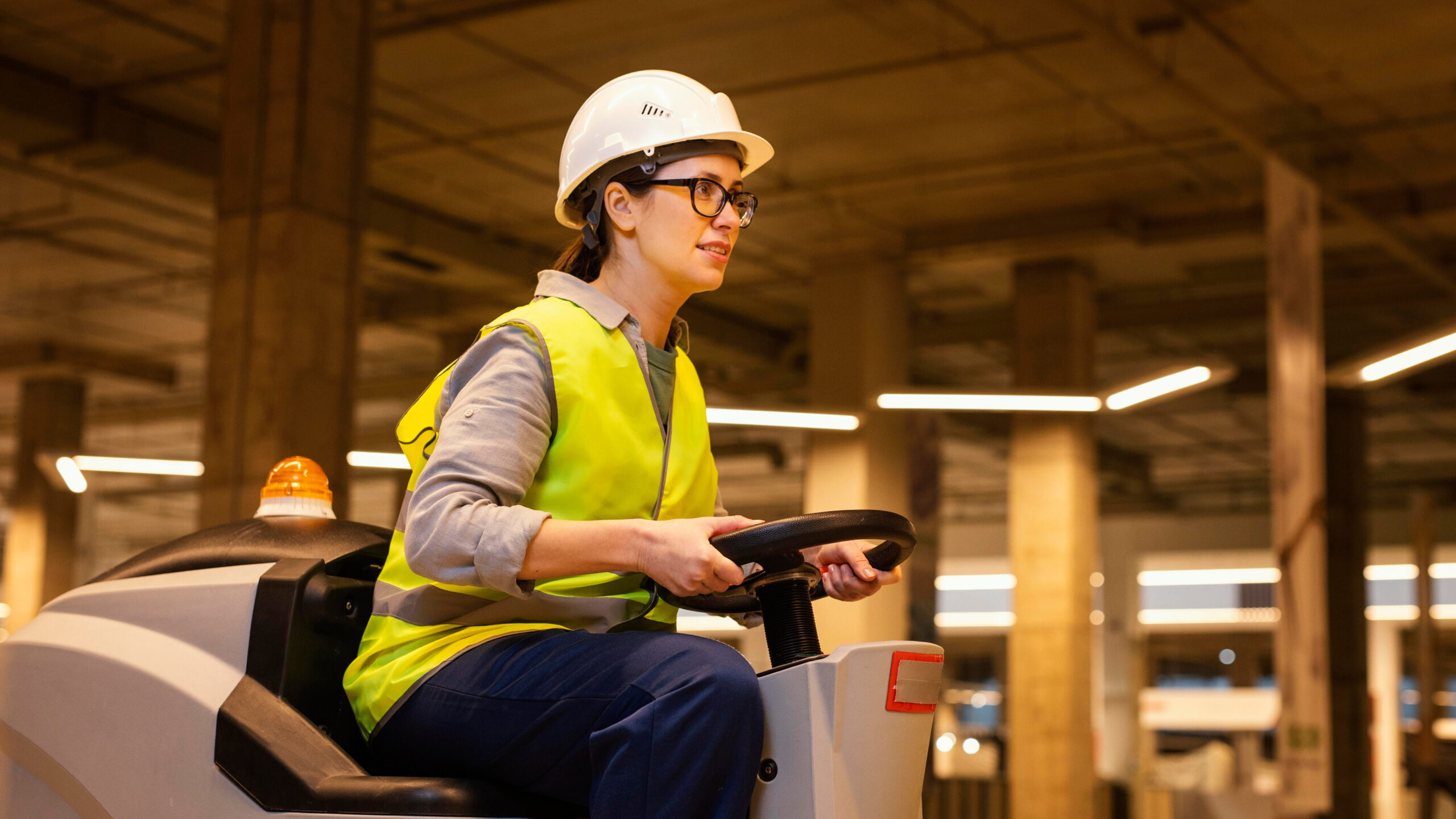 Material handling operator working at industrial facility, USA