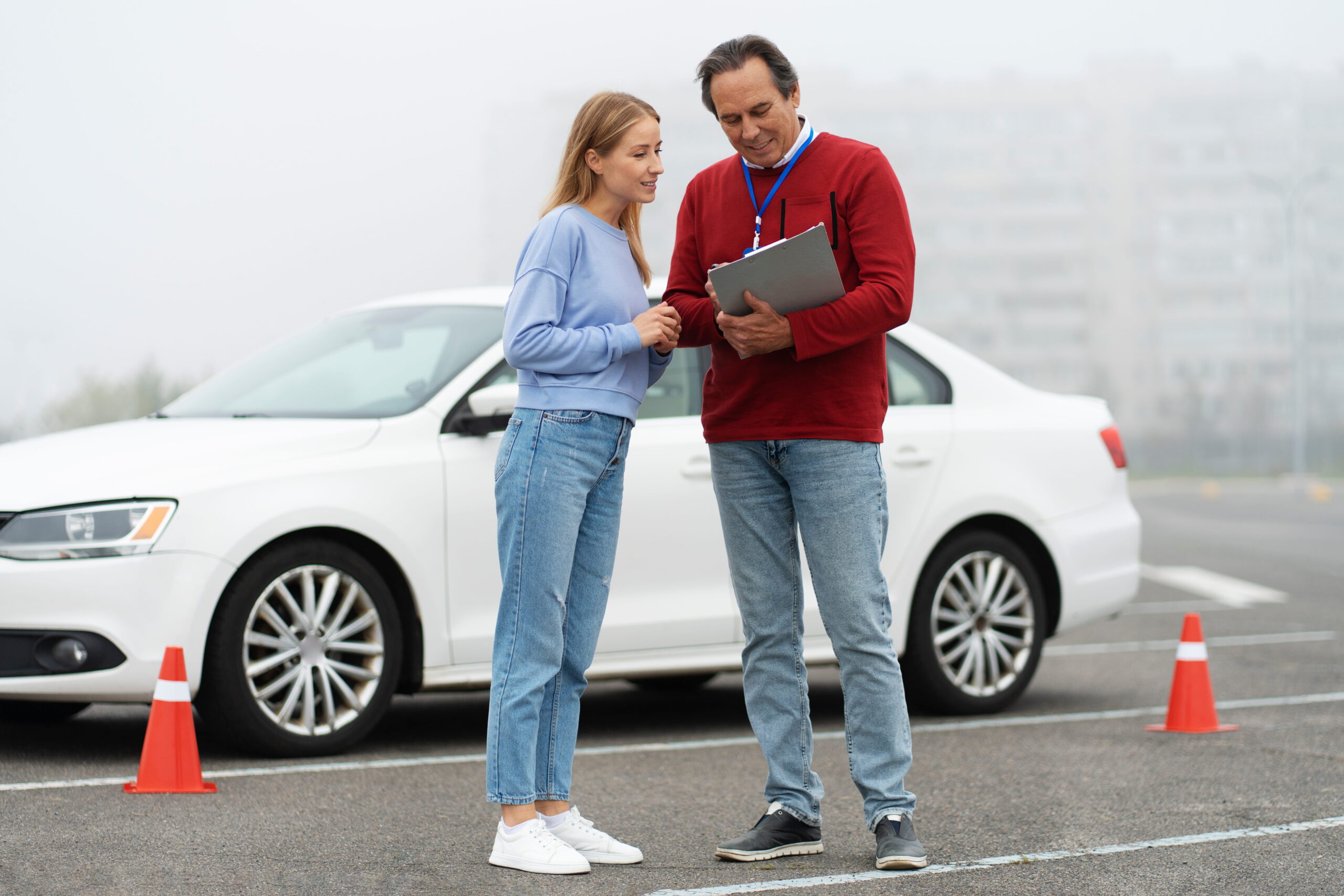 Student practicing driving with instructor for USA driving license test