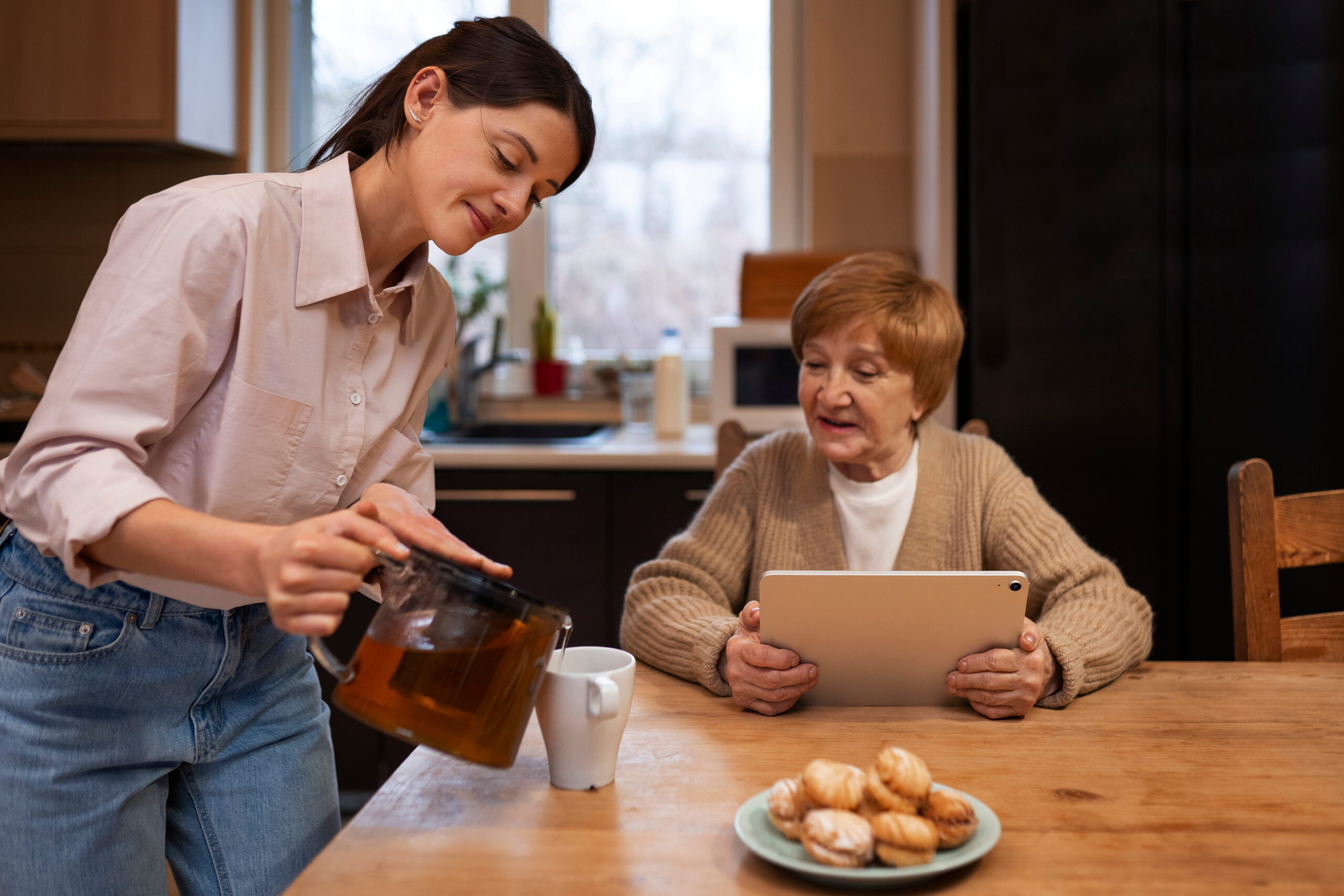 Home health aide organizing medication schedule for patient in caregiver job Jackson MI