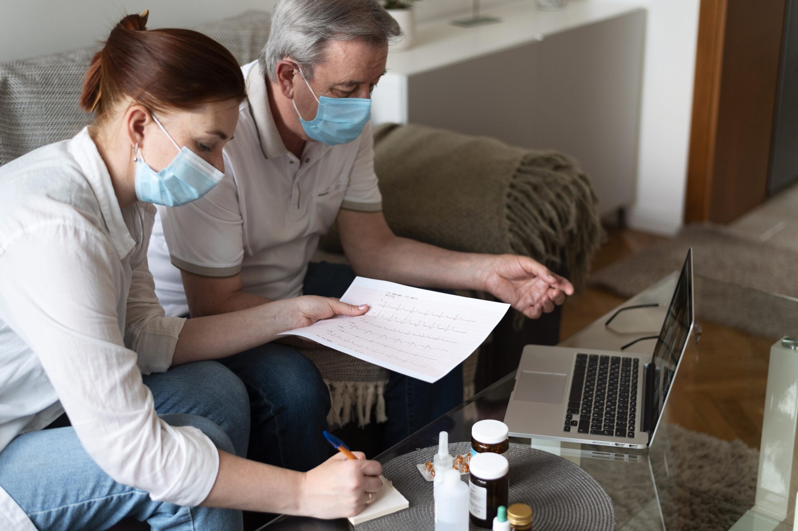 Caregiver assisting elderly patient at home in Jackson Michigan during home care job