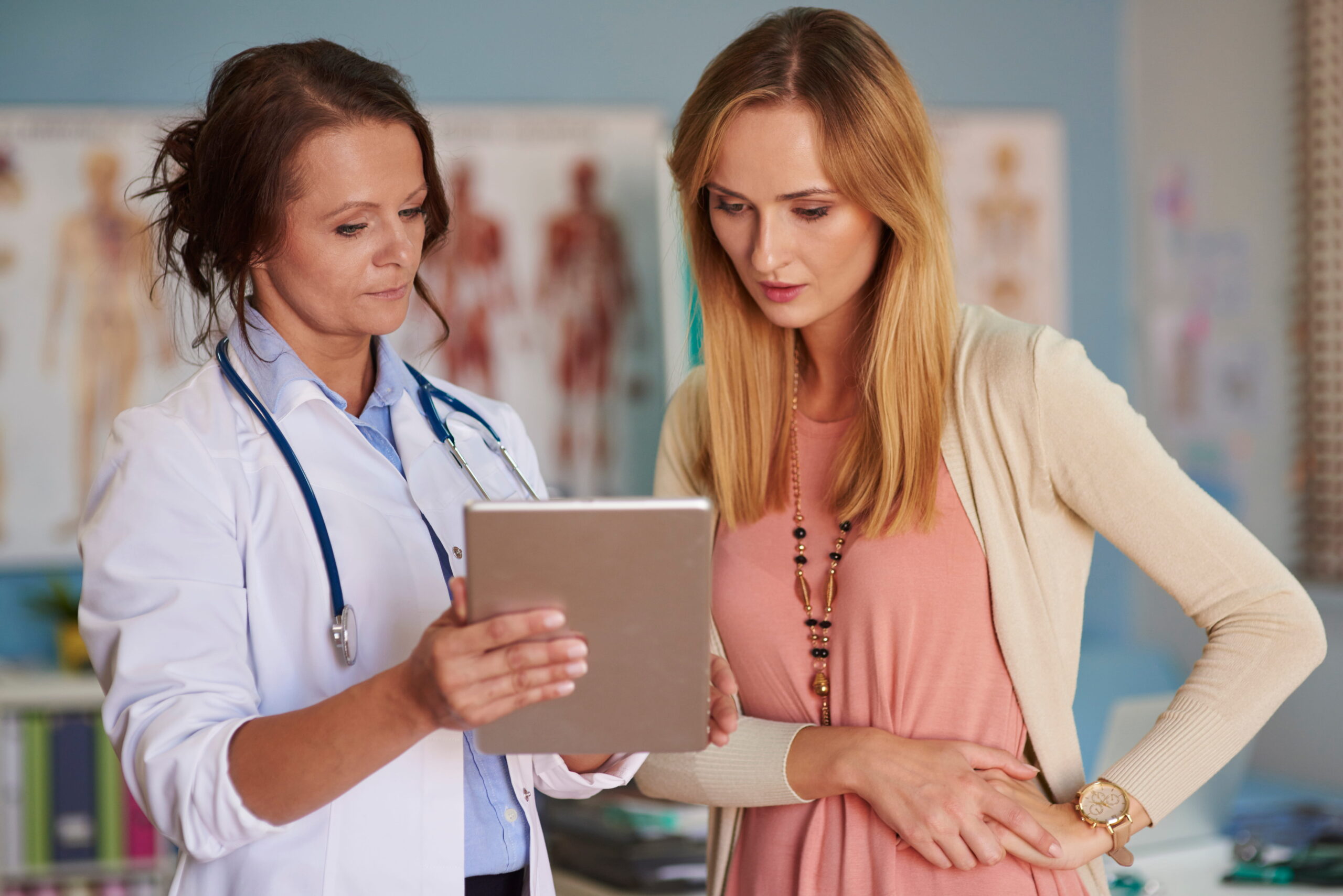 Nurse Practitioner Jobs USA 2026 occupational health nurse practitioner consulting a patient in a workplace clinic