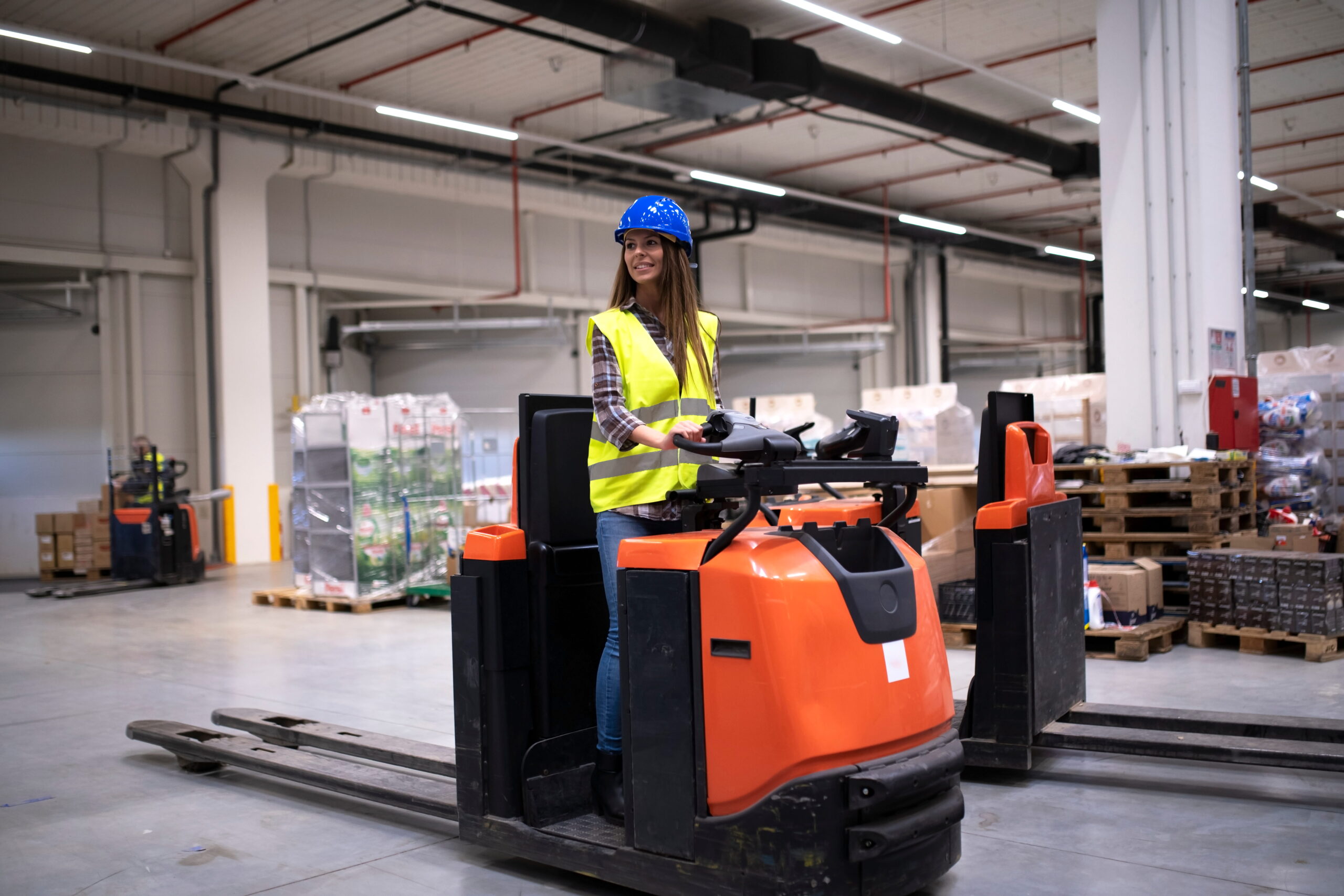walmart distribution center worker using forklift pallet usa warehouse
