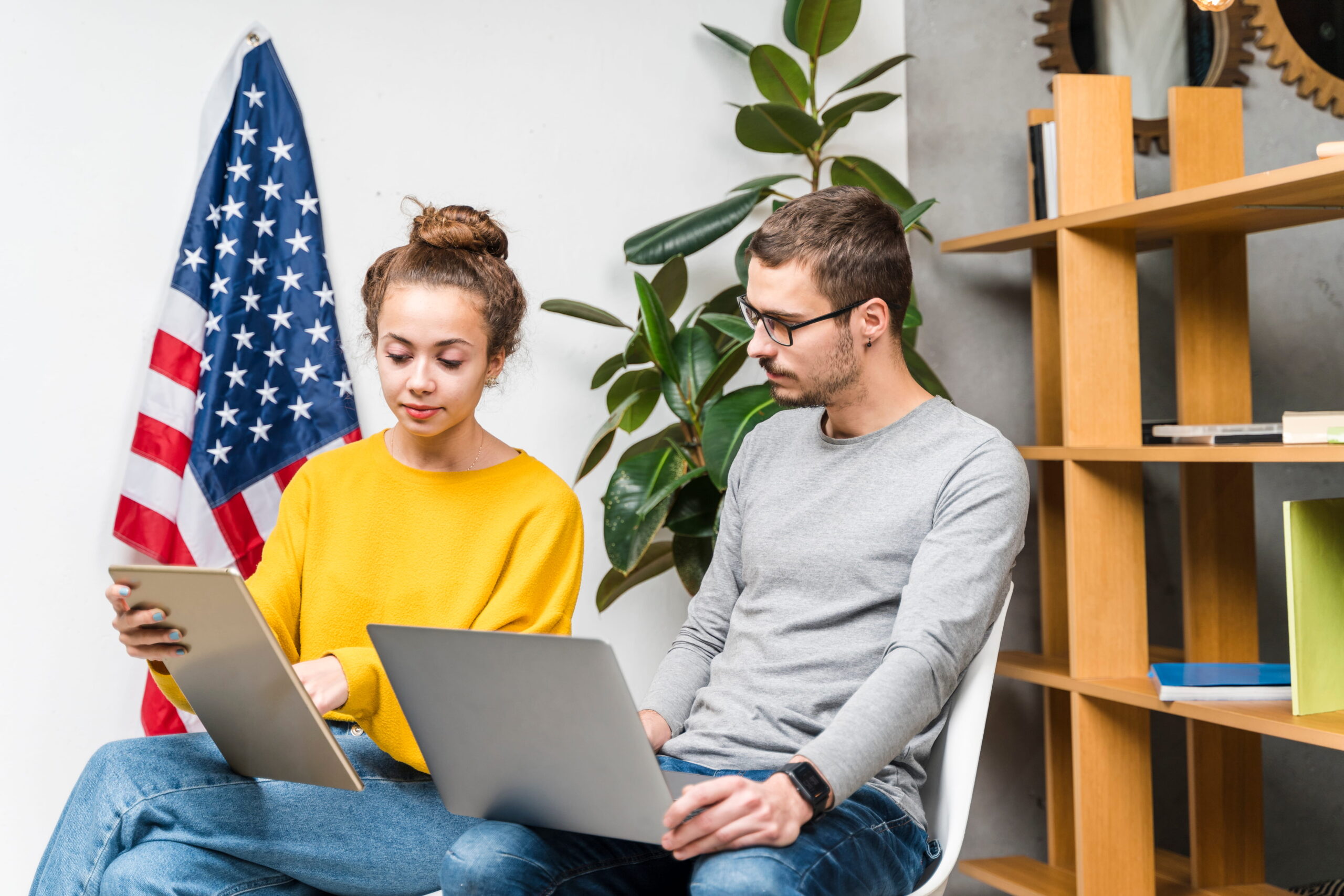 Young professional working remotely applying for USA jobs from home in 2026
